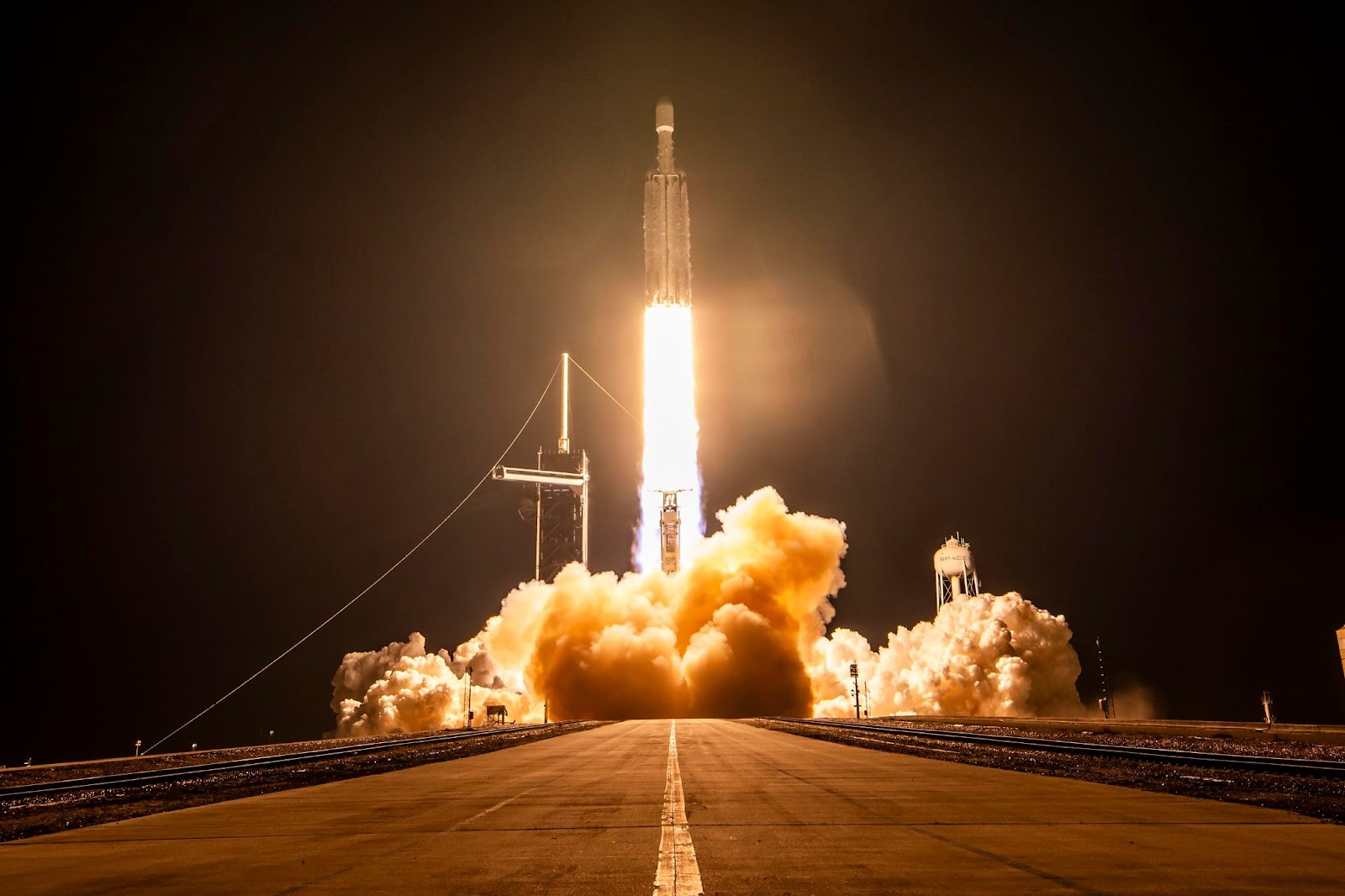 A Falcon Heavy carrying the military's X-37B spaceplane lifting off