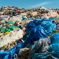 A pile of plastic bags on the ground.