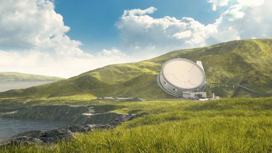 An image of a large antenna on a grassy hill used by SpinLaunch.