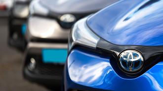 a row of parked Toyotas